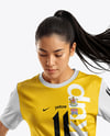 Woman Wearing Soccer Jersey and Shorts Mockup