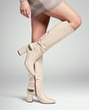 Pair of High-Knee Boots on Women's Legs with Dress Mockup