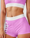 Woman Wearing Sports Bra and Shorts Mockup