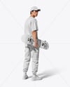 Young Man Wearing T-Shirt and Cargo Pants Holding Skateboard Mockup