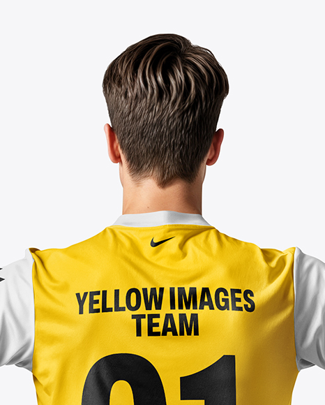 Man Wearing Soccer Jersey and Shorts Mockup