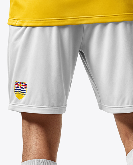 Soccer Player Wearing Jersey and Shorts Mockup
