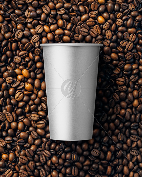 16oz Paper Cup on a Stack of Coffee Beans Mockup