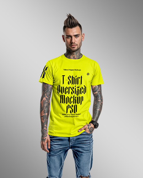 Man with Tattoos Wearing T-Shirt and Jeans Mockup