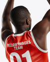 Basketball Player Wearing Jersey and Shorts Throwing Basketball Mockup