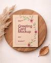 Greeting Card on Wooden Board Mockup