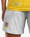 Woman Wearing Soccer V-Neck Jersey and Shorts Mockup