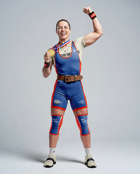 Woman Wearing Weightlifing Suit with Medal Mockup