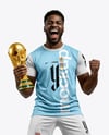 Soccer Player Wearing Jersey and Shorts Holds Cup Mockup