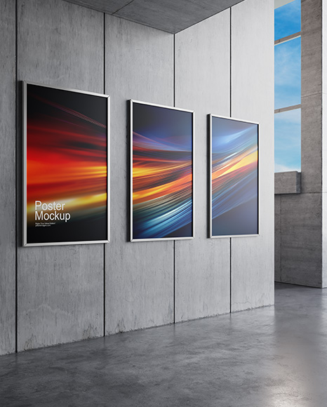 Three Framed Posters on Concrete Wall Mockup
