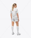 Female Soccer Player Wearing Jersey and Shorts Mockup