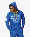 Black Man Wearing a Hoodie and Pants Mockup