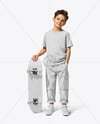 Boy Wearing T-Shirt and Cargo Pants with Skateboard Mockup