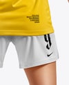 Female Soccer Player Wearing Jersey and Shorts Mockup