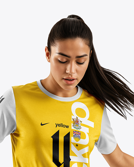 Female Soccer Player Wearing Jersey and Shorts Mockup
