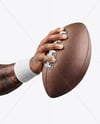 American Football Ball in a Hand Mockup