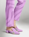 Pair of Suede Mules on Woman's Legs Mockup