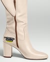 Pair of High-Knee Boots on Women's Legs with Dress Mockup