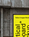 Vertical Billboard on a Brick and Concrete Wall Mockup