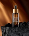 Amber Dropper Bottle on the Rock Mockup