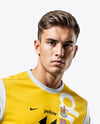 Man Wearing Soccer Jersey and Shorts Mockup