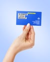 Business Card in a Hand Mockup