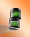 Two Amber Cosmetic Jars on the Glass Mockup