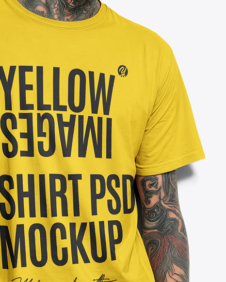 Young Man with Tattoo Wearing T-shirt and Ripped Jeans Mockup