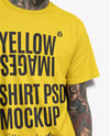 Young Man with Tattoo Wearing T-shirt and Ripped Jeans Mockup