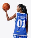 Female Basketball Player Wearing Jersey and Shorts Mockup