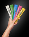 Five Sachets in a Hand Mockup