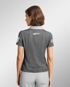 A Woman Wearing a Polo Shirt and Pants Mockup