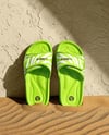 Slide Sandals Next to The Wall Mockup