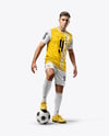 Man Wearing Soccer Jersey and Shorts Mockup
