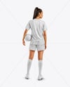 Female Soccer Player Wearing Jersey and Shorts Mockup