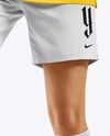 Woman Wearing Soccer Jersey and Shorts Mockup