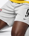 Soccer Player Wearing Raglan Jersey and Shorts Mockup