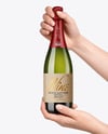 Green Glass Champagne Bottle in Hands Mockup