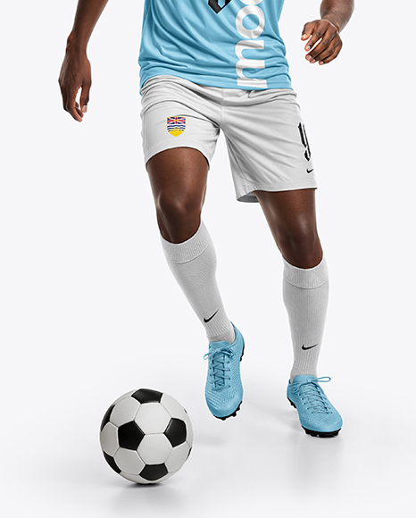 Soccer Player Wearing Raglan Jersey and Shorts Mockup