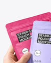 Two Matte Stand-Up Pouch in Hands Mockup