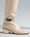 Pair of High-Knee Boots on Women's Legs with Dress Mockup