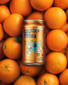 12oz Drink Can on a Stack of Oranges Mockup