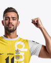 Man Wearing Soccer Jersey and Shorts Mockup