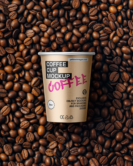 9oz Paper Cup on a Stack of Coffee Beans Mockup