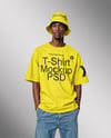 Black Man Wearing T-Shirt and Bucket Hat Mockup