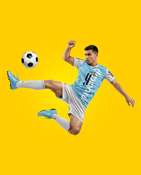 Man Wearing Soccer Jersey and Shorts Mockup