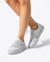 Pair of Sneakers on Women's Legs Mockup