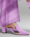 Pair of Suede Mules on Woman's Legs Mockup