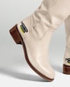 Pair of High-Knee Boots on Women's Legs with Dress Mockup
