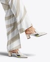 Pair of Suede Mules on Woman's Legs Mockup